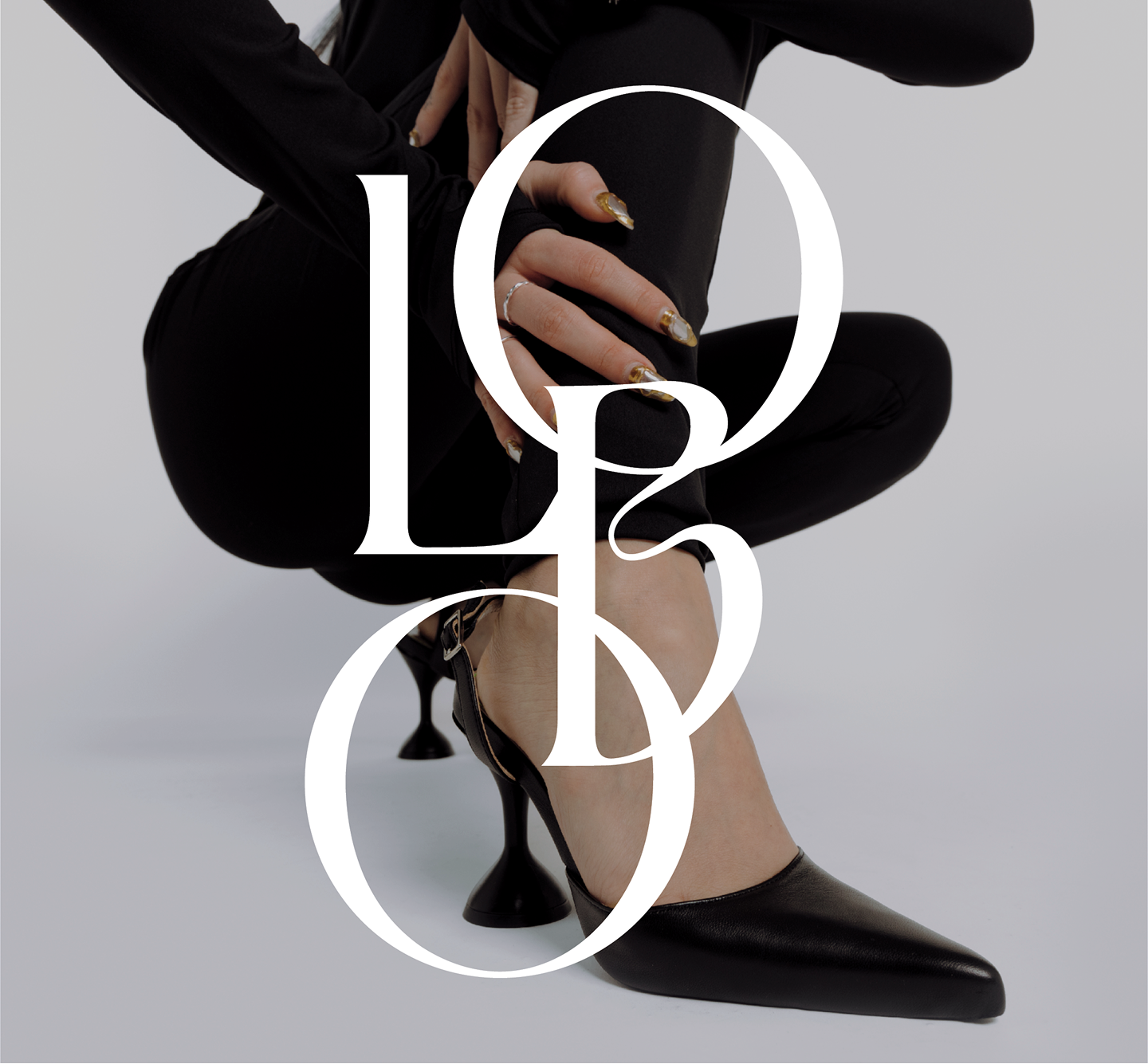 LOBO convertible heel styled with a black outfit